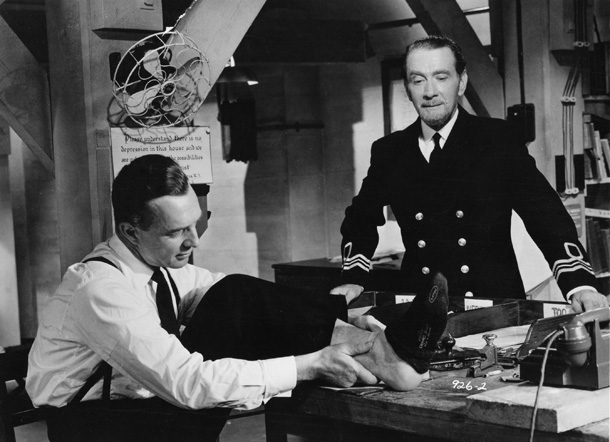 Robert Flemyng and Clifton Webb in The Man Who Never Was